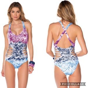 Becca one piece cut out swim suit.